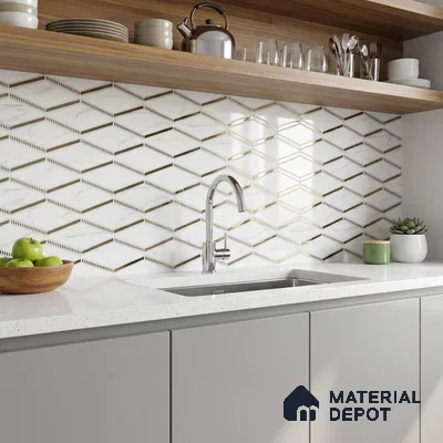 Modern kitchen with geometric marble-look backsplash tile, white quartz countertop, and light grey laminate cabinets