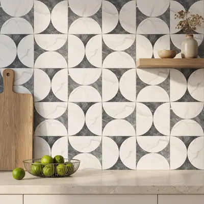 Modern kitchen with geometric marble-look backsplash tiles and beige quartz countertop