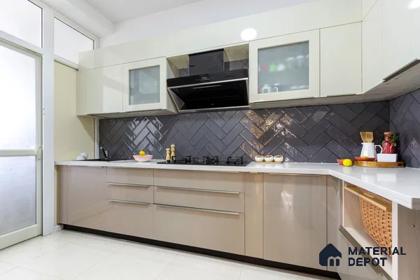 Modern kitchen with glossy beige and frosty white laminate, black herringbone subway tile backsplash, and white quartz countertop in Bengaluru | Material Depot