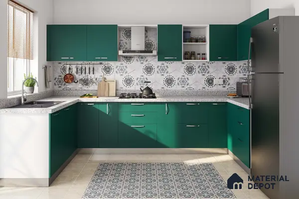 Modern kitchen with green laminate cabinets, terrazzo countertop, and floral patterned backsplash tiles in Bengaluru | Material Depot