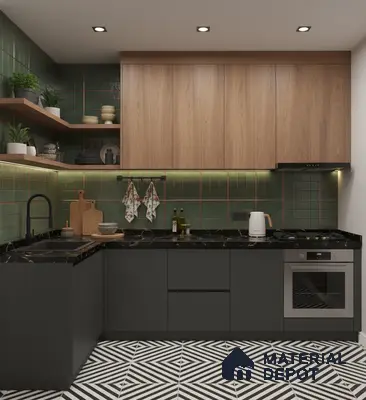 Modern kitchen with green wall tiles, black marble countertop, and geometric black-and-white floor tiles in Bengaluru