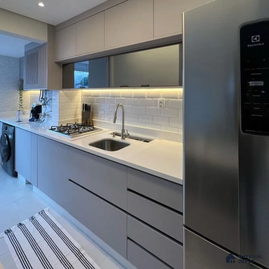 Modern kitchen with grey matte laminate cabinets, white quartz countertop, and white subway backsplash tiles in Bengaluru | Material Depot