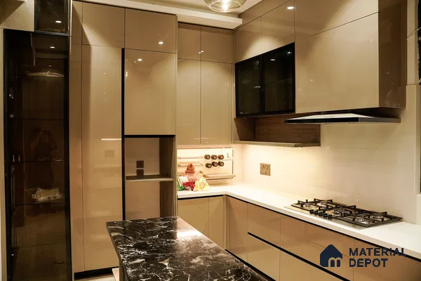 Modern kitchen with high gloss beige laminate, white quartz countertop, and black marble island in Bengaluru | Material Depot
