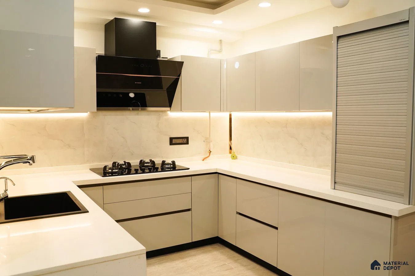 Modern kitchen with high gloss beige laminate, white quartz countertop, and marble-look backsplash in Bengaluru | Material Depot