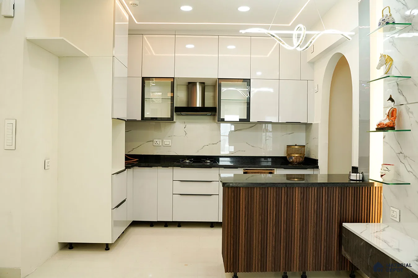 Modern kitchen with high gloss white laminate, black granite countertop, marble-look backsplash, and fluted wood island in Bengaluru | Material Depot