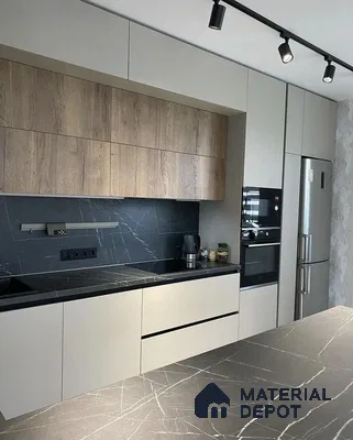 Modern kitchen with light beige laminate, oak wood laminate, and black marble-look countertop in Bengaluru | Material Depot