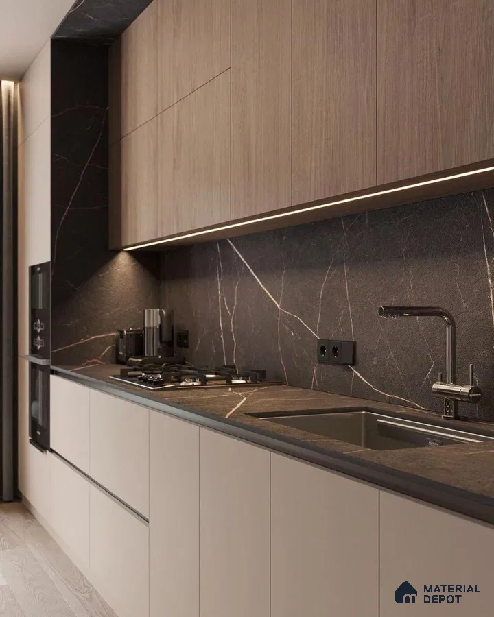 Modern kitchen with light wood laminate, beige laminate base cabinets, and dark marble-look backsplash and countertop in Bengaluru | Material Depot