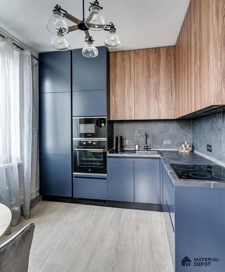 Modern kitchen with matte navy blue laminate, walnut wood laminate, and grey stone backsplash in Bengaluru | Material Depot