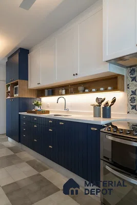 Modern kitchen with navy blue fluted laminate, white solid laminate, and white quartz countertop in Bengaluru | Material Depot