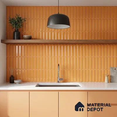 Modern kitchen with orange kitkat wall tiles, peach laminate cabinets, and white quartz countertop