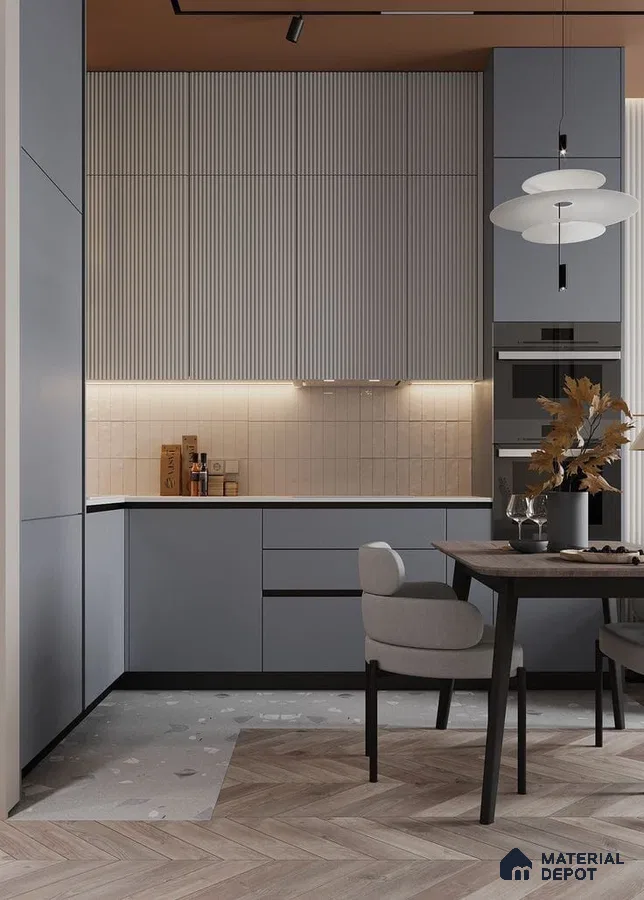 Modern kitchen with pastel blue matte laminate, fluted upper cabinets, and chevron wood tile flooring in Bengaluru | Material Depot
