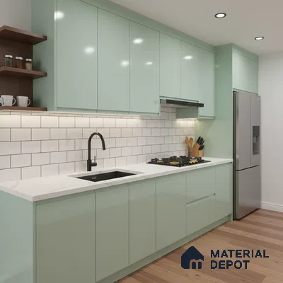 Modern kitchen with pastel green laminate cabinets, white marble-look countertop, and subway tile backsplash in Bengaluru