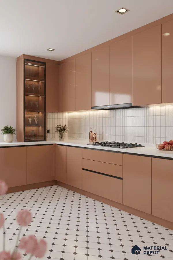 Modern kitchen with peach high gloss laminate cabinets, white quartz countertop, and geometric patterned floor tiles in Bengaluru