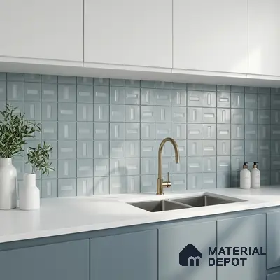 Modern kitchen with powder blue laminate cabinets, white quartz countertop, and geometric blue backsplash tiles