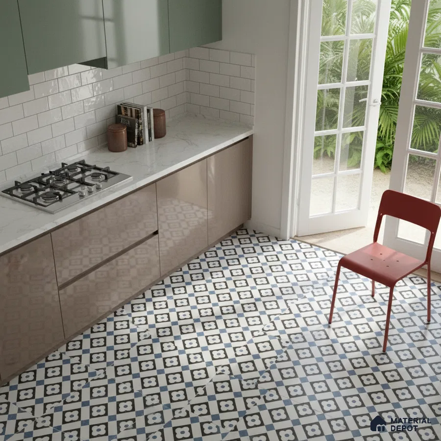 Modern kitchen with sage green and taupe laminate, white marble countertop, and blue geometric patterned floor tiles in Bengaluru