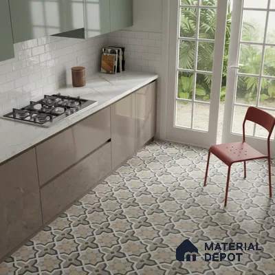 Modern kitchen with sage green and taupe laminate, white marble countertop, and geometric patterned floor tiles in Bengaluru