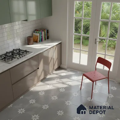 Modern kitchen with sage green and taupe laminate, white marble countertop, and grey floral patterned floor tiles in Bengaluru