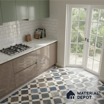 Modern kitchen with sage green and taupe laminate, white marble countertop, subway backsplash, and blue patterned floor tiles in Bengaluru