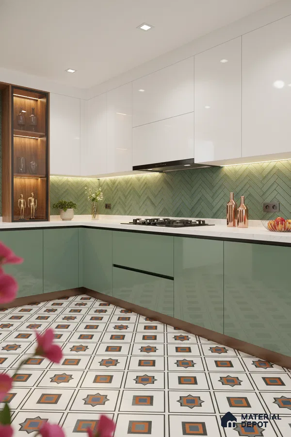 Modern kitchen with sage green and white high gloss laminate, herringbone green tile backsplash, and geometric patterned floor tiles in Bengaluru