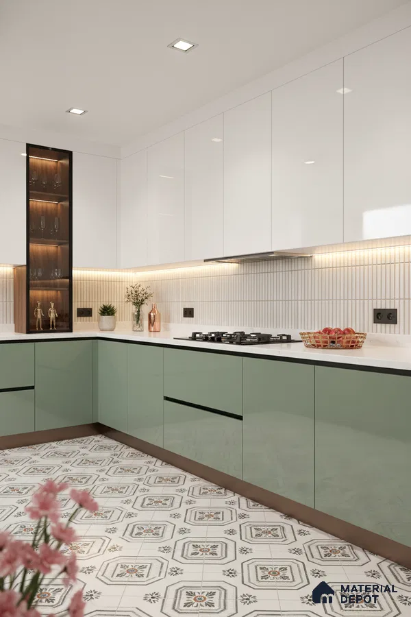 Modern kitchen with sage green and white high gloss laminate, white quartz countertop, and patterned floor tiles in Bengaluru
