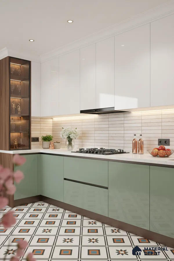 Modern kitchen with sage green and white laminate, white quartz countertop, and geometric patterned floor tiles in Bengaluru