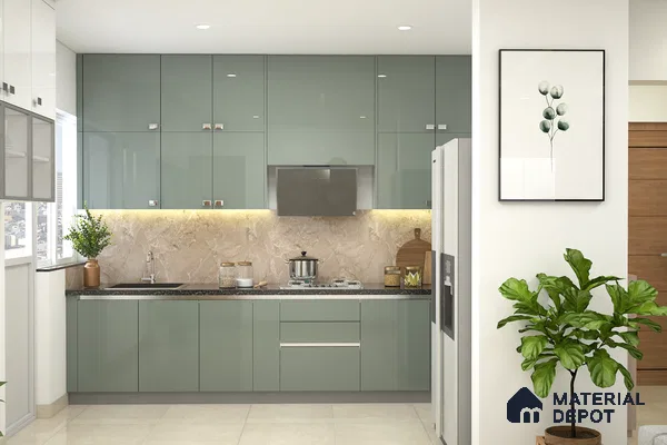 Modern kitchen with sage green high gloss laminate cabinets and beige marble backsplash in Bengaluru | Material Depot