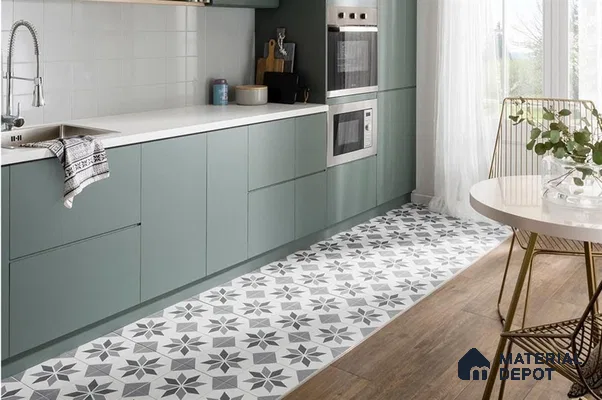 Modern kitchen with sage green laminate cabinets, white quartz countertop, and geometric patterned floor tiles in Bengaluru | Material Depot