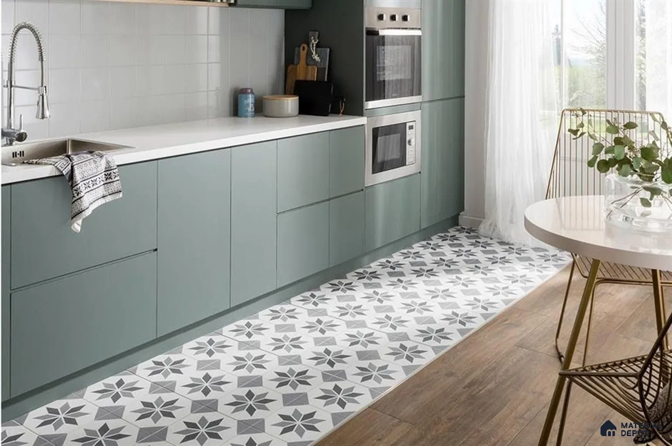 Modern kitchen with sage green laminate cabinets, white quartz countertop, and geometric patterned floor tiles in Bengaluru | Material Depot