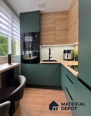 Modern kitchen with sage green laminate, light oak wood laminate, and marble-look backsplash in Bengaluru | Material Depot