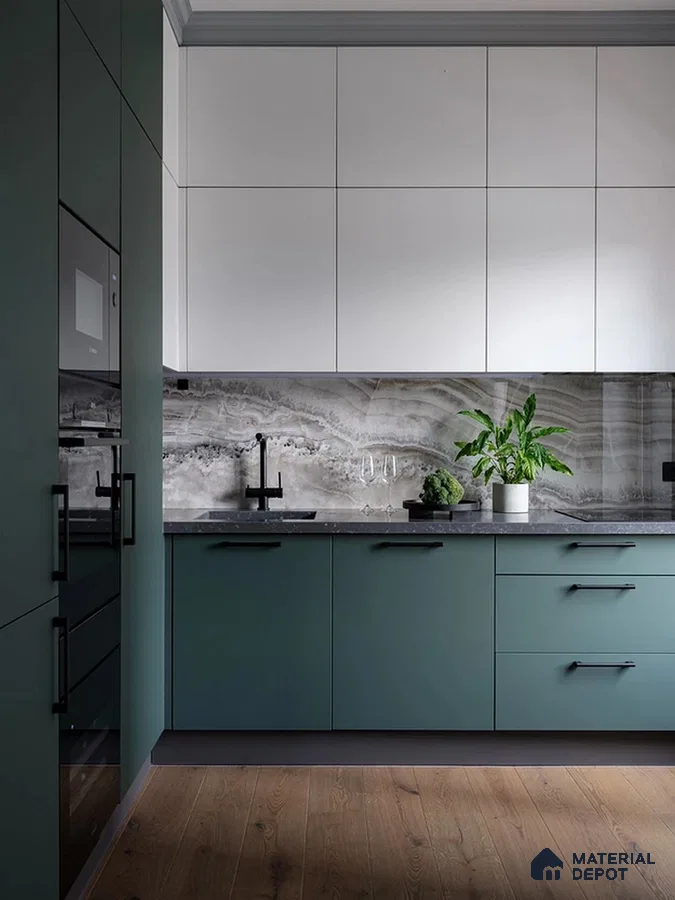 Modern kitchen with sage green laminate, white laminate cabinets, marble-look backsplash, and wooden flooring in Bengaluru | Material Depot