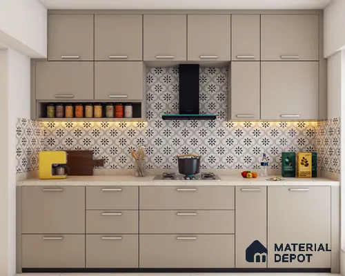 Modern kitchen with taupe matte laminate cabinets and black-and-white floral patterned backsplash tiles in Bengaluru | Material Depot