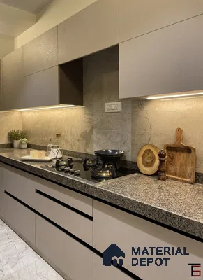 Modern kitchen with taupe matte laminate cabinets, grey granite countertop, and marble-look backsplash in Bengaluru | Material Depot