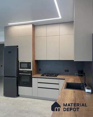 Modern kitchen with taupe matte laminate cabinets, walnut wood countertop, and charcoal backsplash in Bengaluru | Material Depot