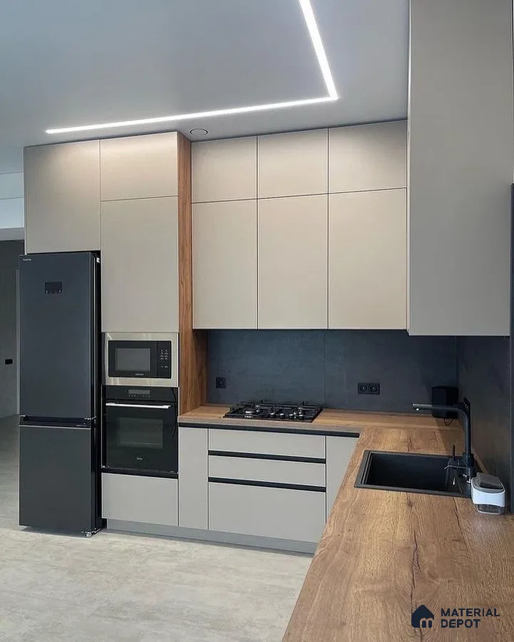Modern kitchen with taupe matte laminate cabinets, walnut wood countertop, and charcoal backsplash in Bengaluru | Material Depot