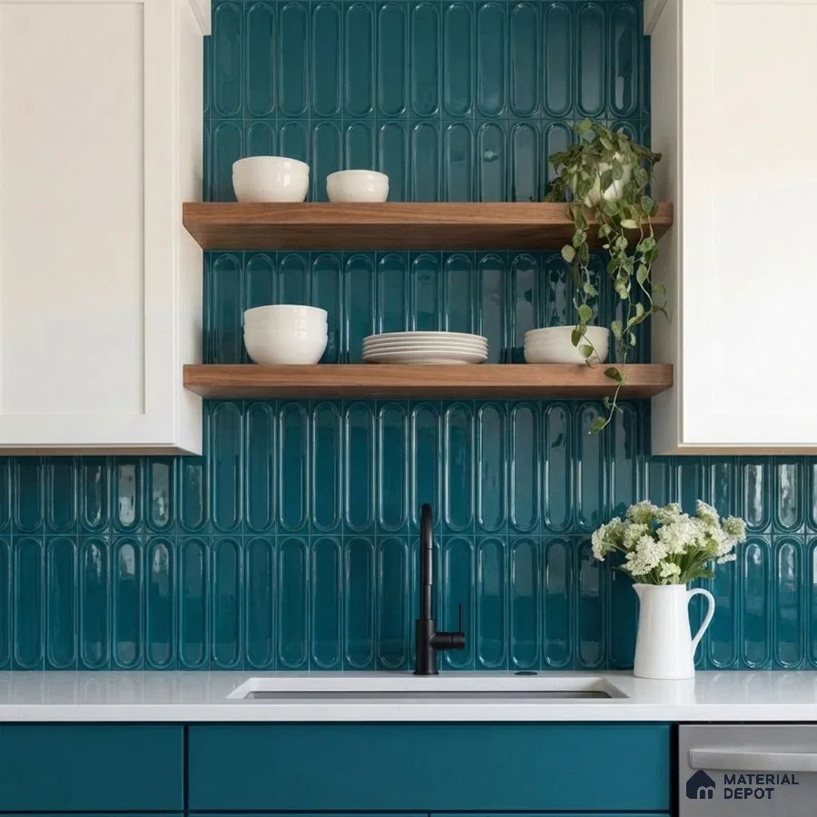 Modern kitchen with teal kitkat subway backsplash tile, white quartz countertop, and teal laminate cabinets