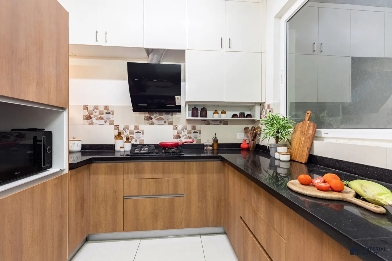 Modern kitchen with walnut brown wood laminate, white solid laminate, and black granite countertop in Bengaluru | Material Depot