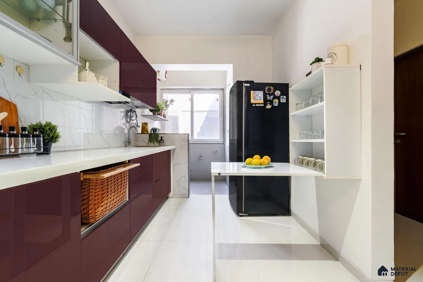 Modern kitchen with wine high gloss laminate cabinets and white marble-look backsplash in Bengaluru | Material Depot