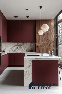 Modern kitchen with wine red matte laminate, white marble-look backsplash and countertop, and walnut wood accent in Bengaluru | Material Depot