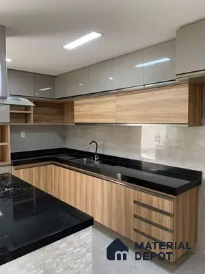 Modern kitchen with wood grain laminate, glossy beige laminate, and black granite countertop in Bengaluru | Material Depot