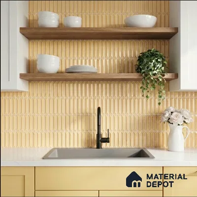 Modern kitchen with yellow geometric backsplash tile, white quartz countertop, and light wood open shelves