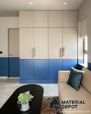 Modern living room with dual-tone beige and navy blue laminate wardrobe and marble floor tile | Material Depot