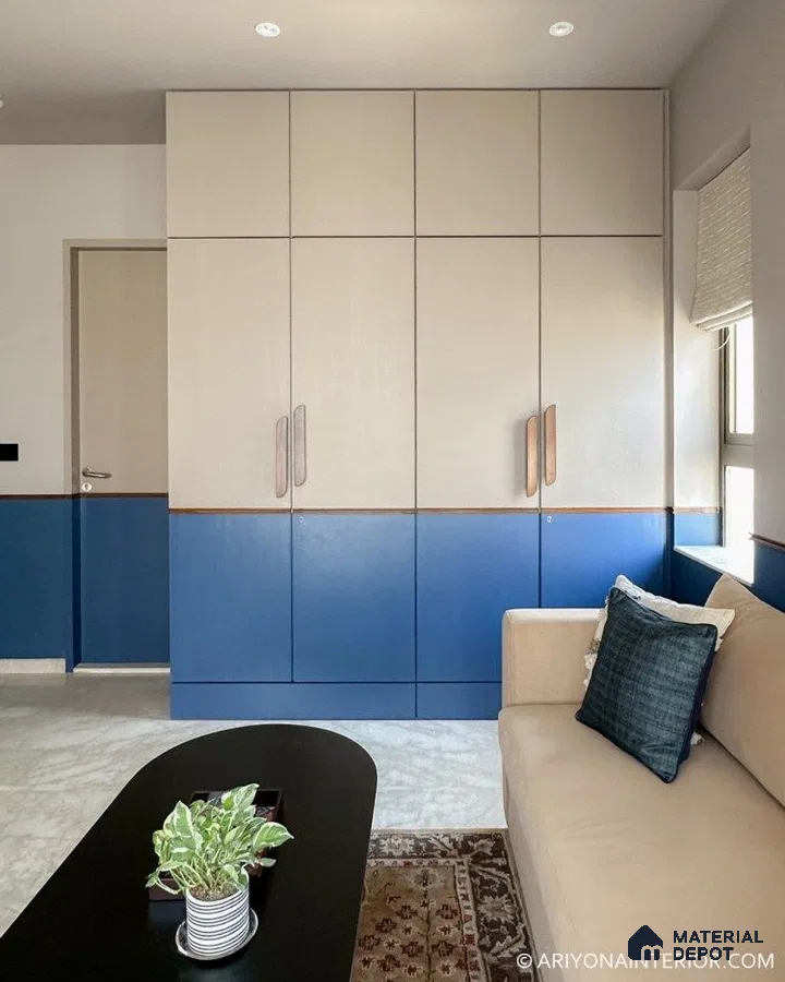 Modern living room with dual-tone beige and navy blue laminate wardrobe and marble floor tile | Material Depot