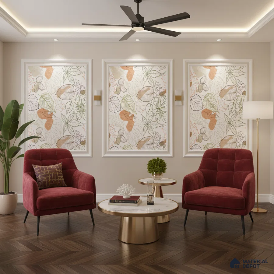 Modern living room with floral wallpaper panels, burgundy velvet chairs, and herringbone wooden flooring in Bengaluru