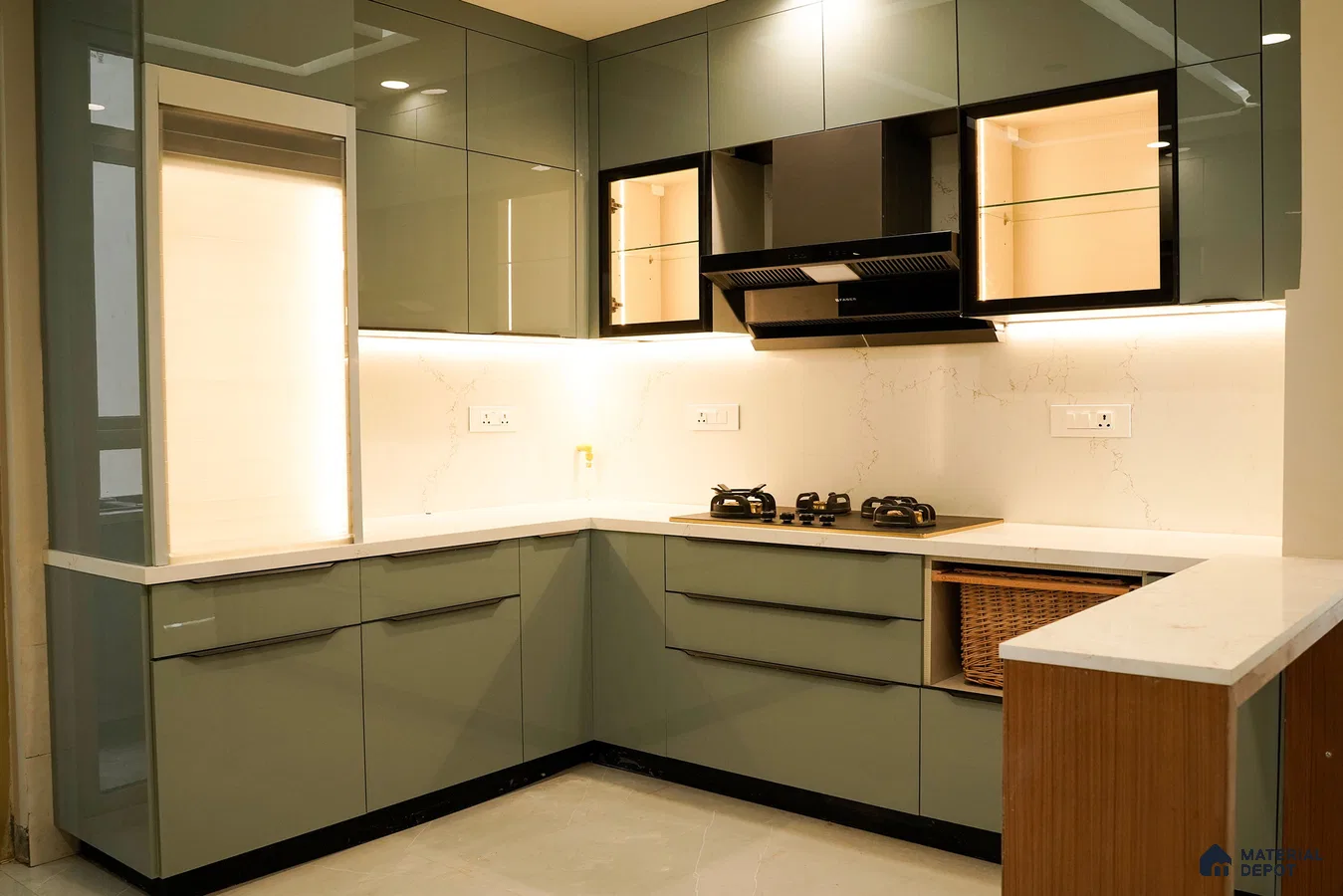 Modern L-shaped kitchen with sage green high gloss laminate, white marble-look quartz countertop, and marble-look backsplash in Bengaluru | Material Depot