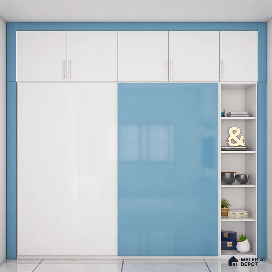 White sliding doors open to a very large closet organizer system with abundant storage space