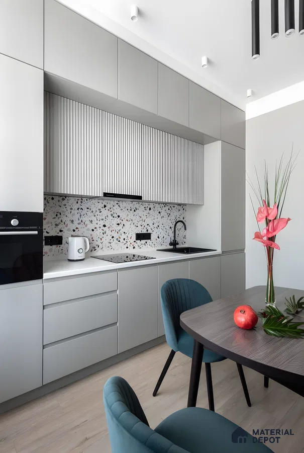 Modern Minimalist Kitchen With Fluted Cabinets And Terrazzo Backsplash | Material Depot