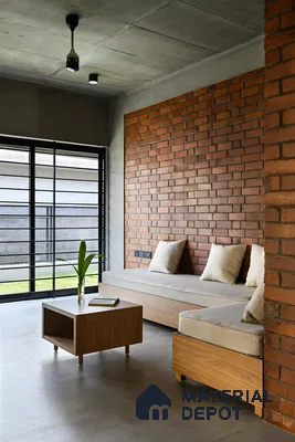 Modern Minimalist Living Space with Exposed Brick and Natural Textures | Material Depot