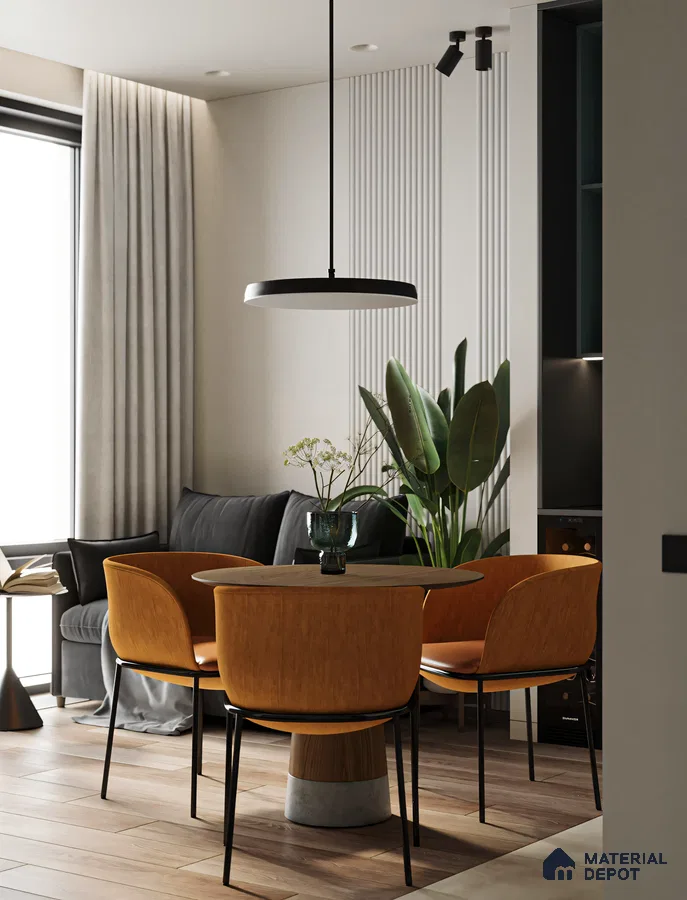 Modern Open-Plan Living Space with Round Dining Table and Orange Chairs | Material Depot