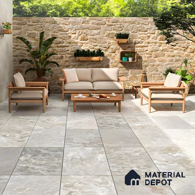 Modern Outdoor Living Space with Stone Wall and Grey Porcelain Tiles | Material Depot