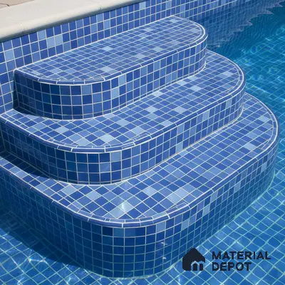 Modern outdoor pool with blue mosaic tiles on steps and walls